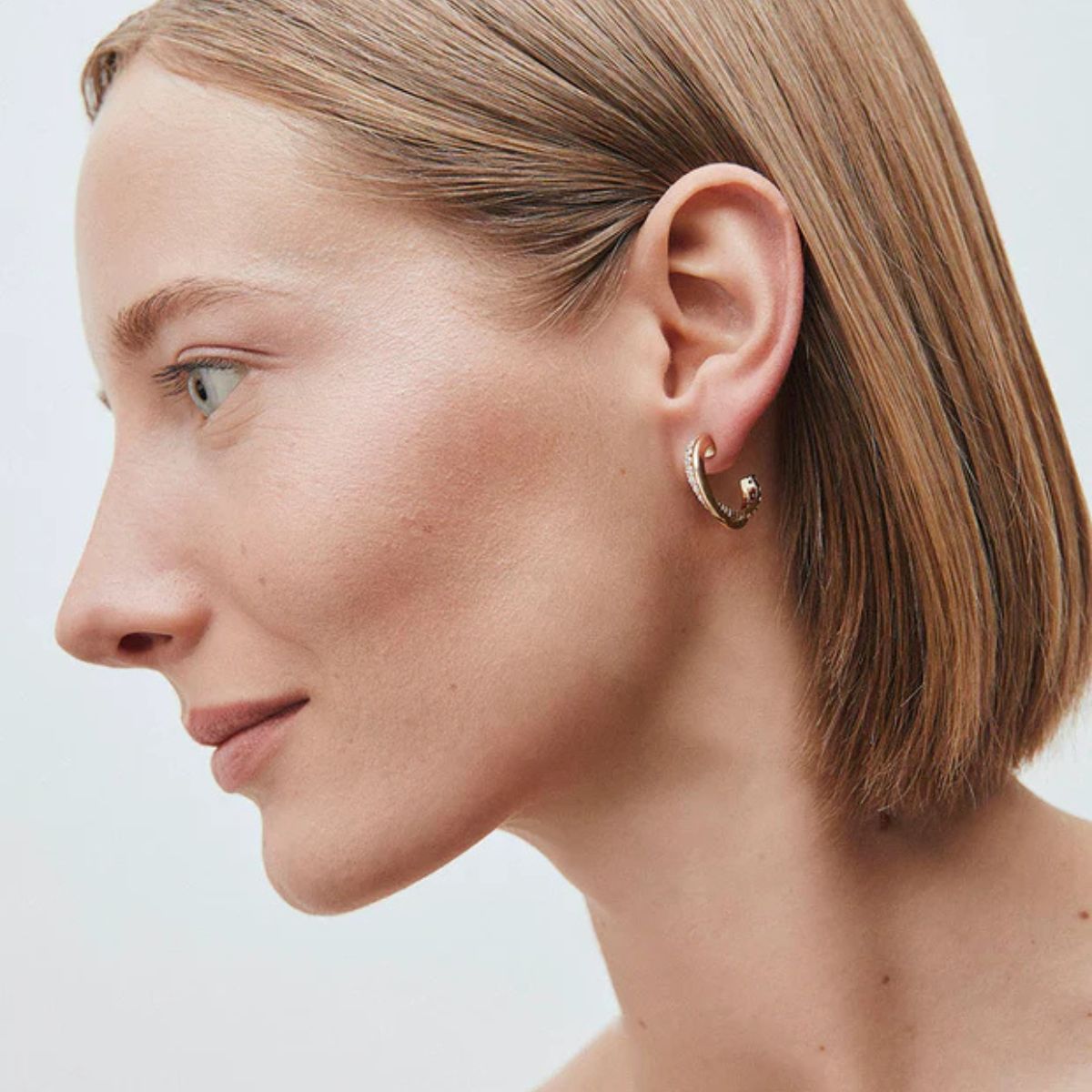 PENDIENTES VIDAL & VIDAL AROS ENTRELAZADOS BAÑADOS EN ORO Y CON CIRCONITAS G4014