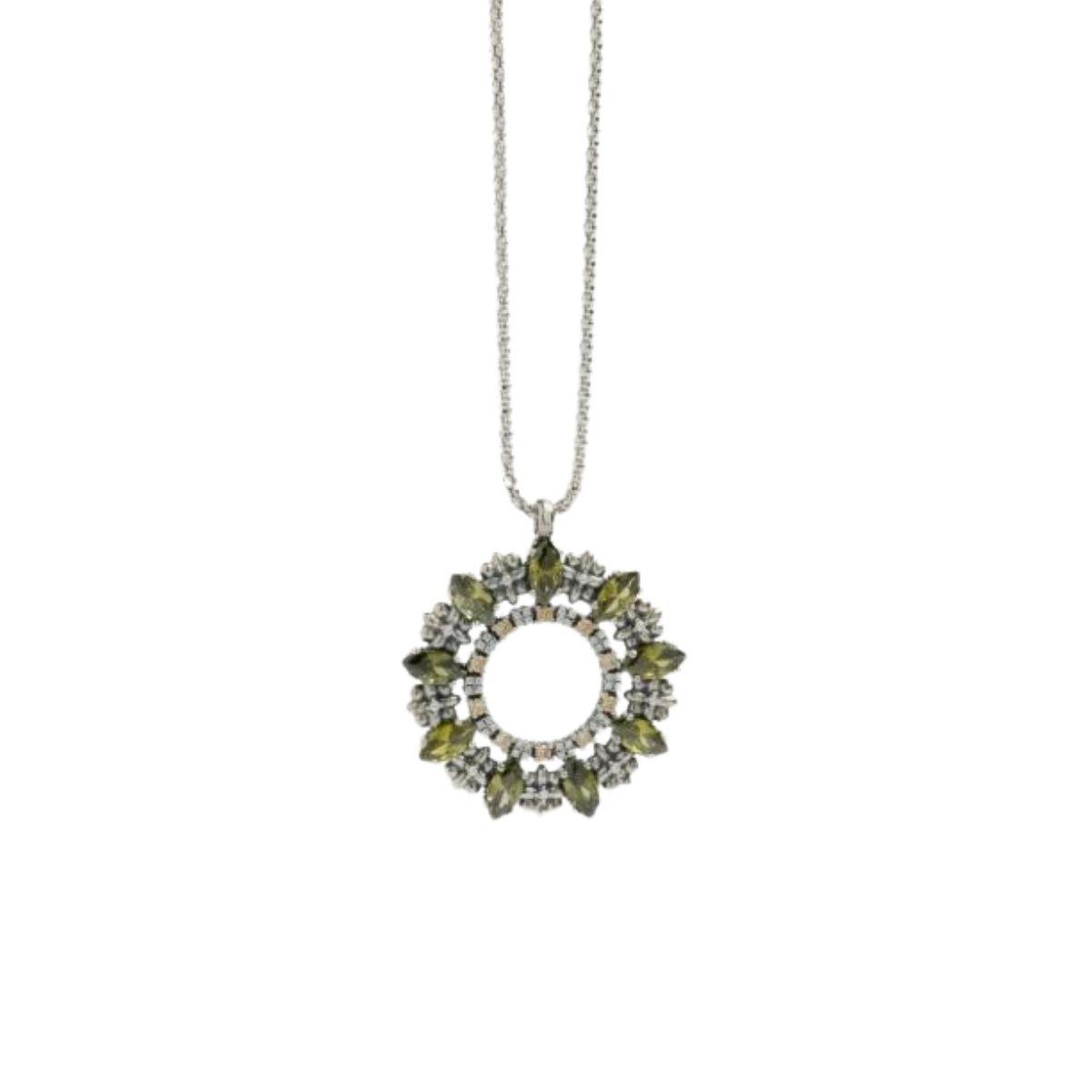 penjoll sunfield en forma circular de plata i circonites en tons vede, cava i blanc perla