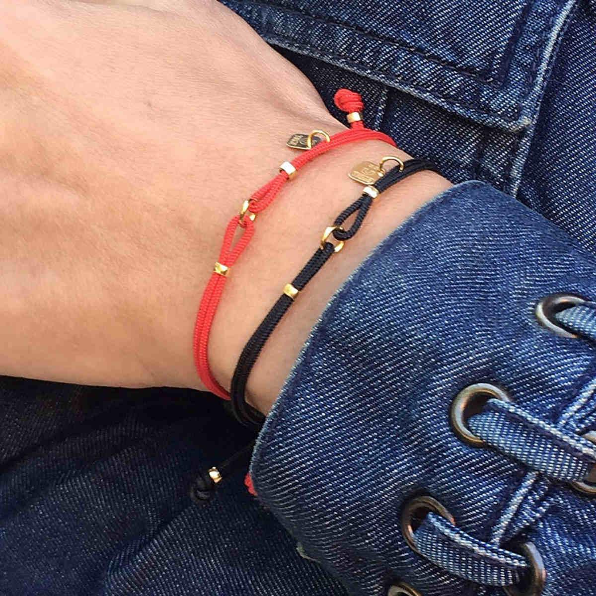 PULSERA TIQÜE BARCELONA NEXO NEGRO ORO