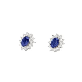 Mabina silver earrings featuring an oval synthetic blue sapphire and surrounding white cubic zirconia.