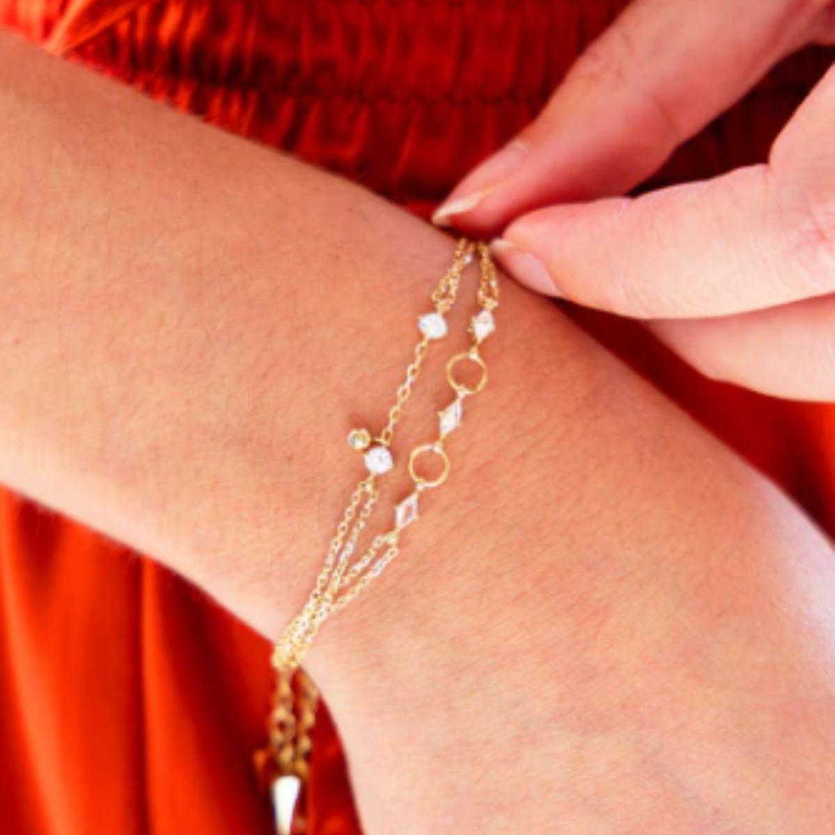 PULSERA ZAG BIJOUX DENEBA DE ACERO COLOR DORADO CON DOBLE CADENA Y CIRCONITA SBS24442-01WHT