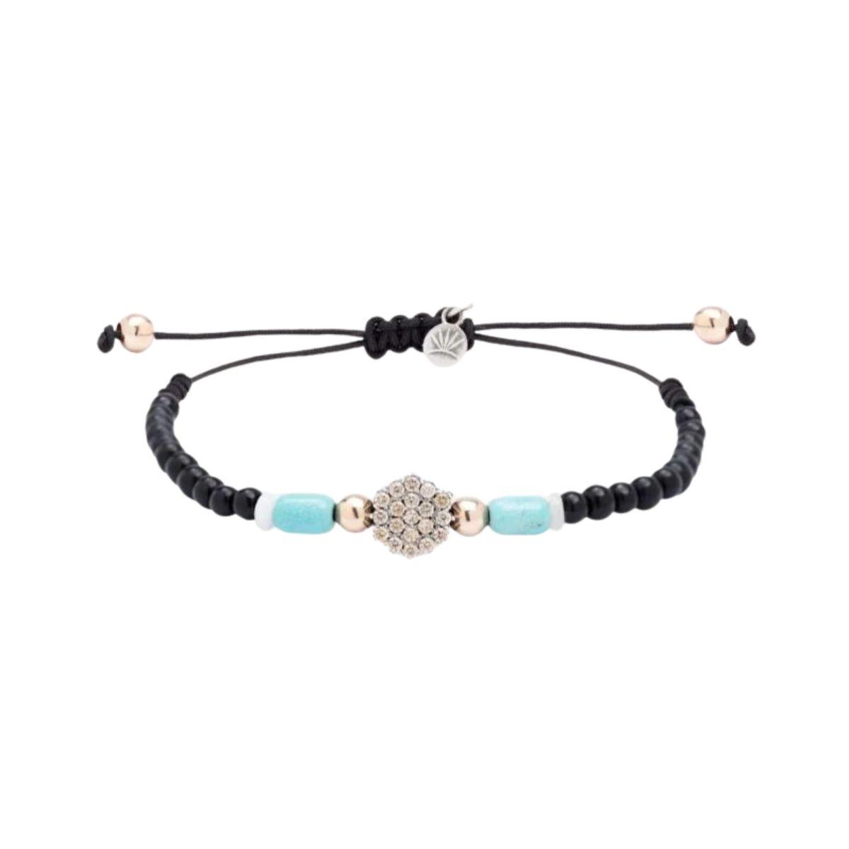 Sunfield brand bracelet with crystal beads, cubic zirconia, and nylon; adjustable bracelet.