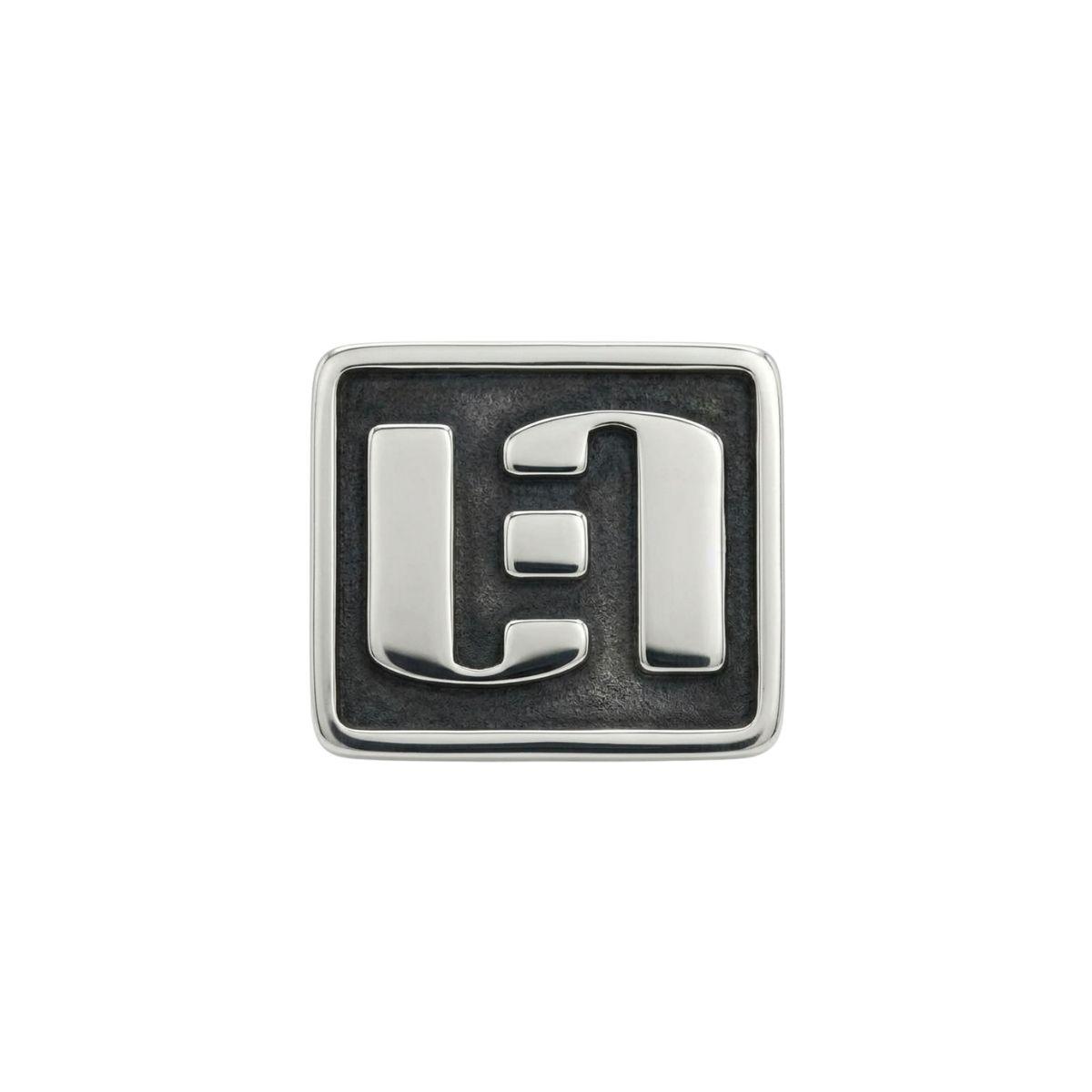 Sample silver pin. We customize any logo and transform it into a pin. Reinforce your corporate image.